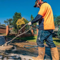 How to Effectively Remove Oil Stains with Commercial Pressure Washing