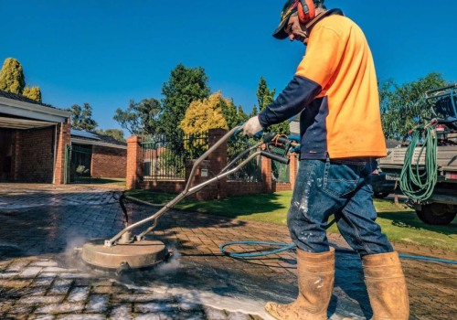 How to Effectively Remove Oil Stains with Commercial Pressure Washing